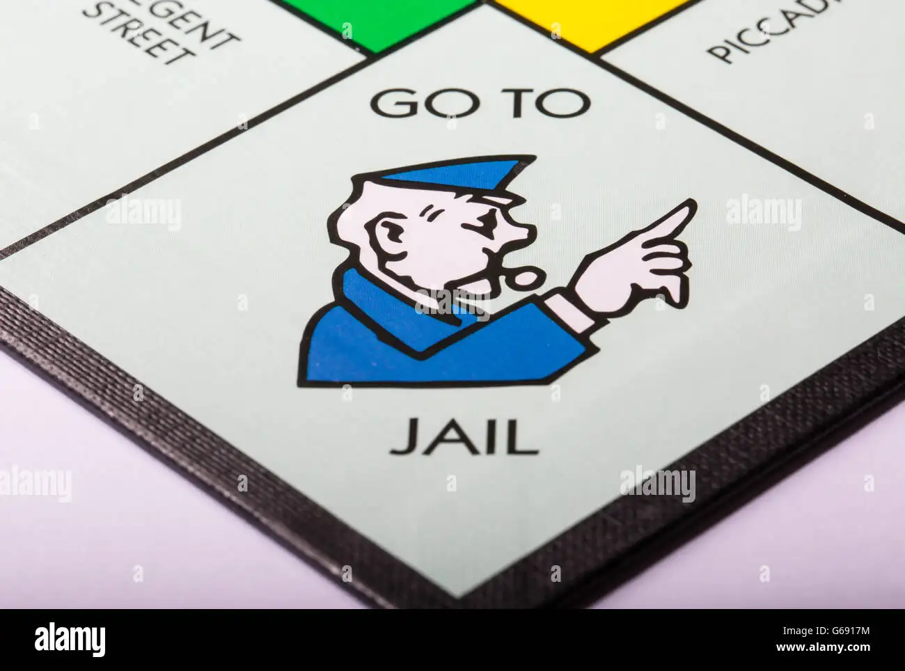 go-to-jail-notice-on-a-monopoly-board-G6917M.webp