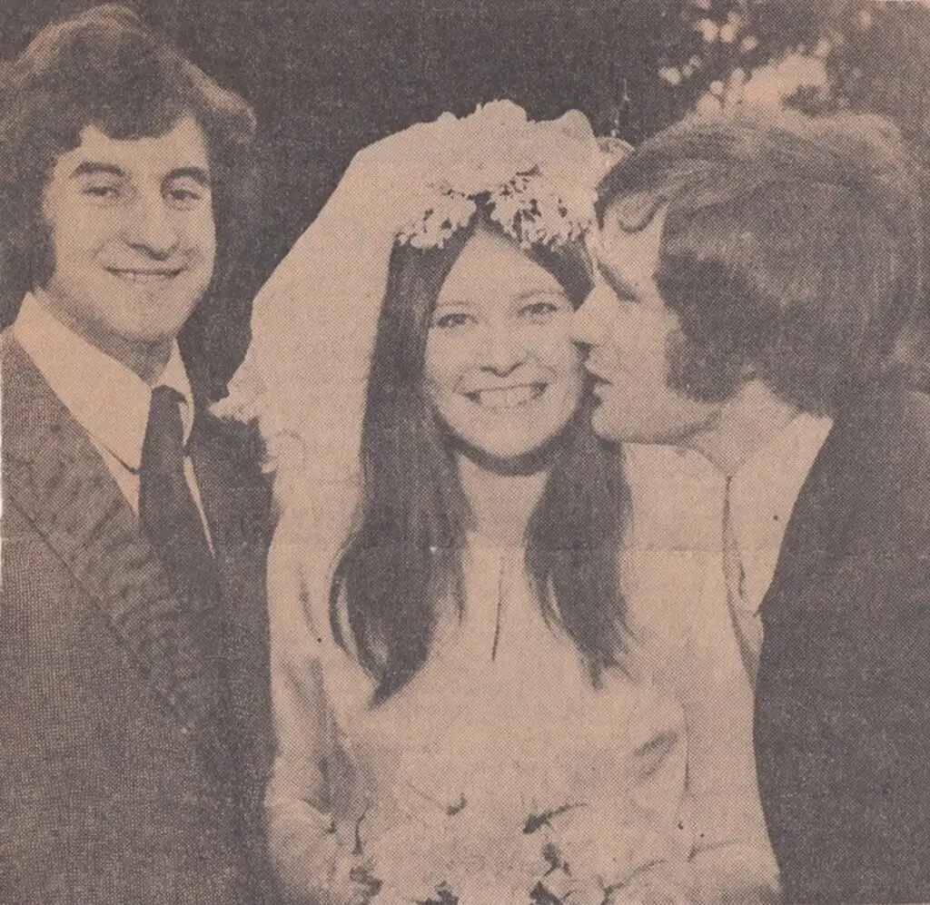 Jimmy-and-Val-on-their-wedding-day-a-kiss-for-Val-from-Colin-Harvey-1024x997.webp