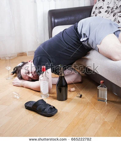 stock-photo-drunkard-tired-mature-man-sleep-on-the-sofa-at-the-home-665222782.webp