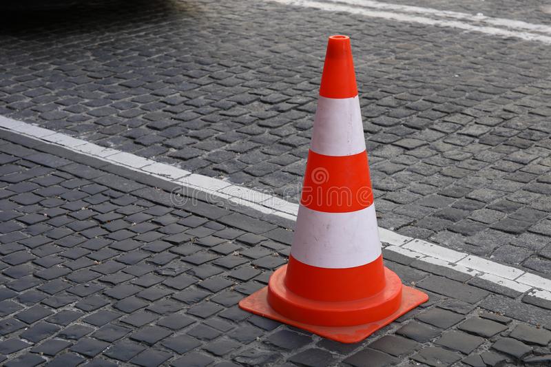 traffic-cone-road-cobble-stone-149363975.jpg