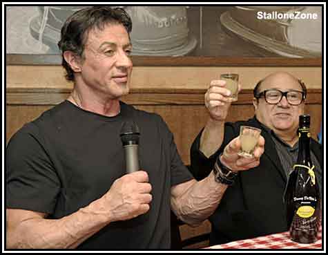 012909sly_devito_cheers.jpg