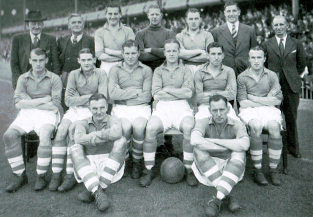 Kelly-in-hat-and-EFC-Team-1947.jpg
