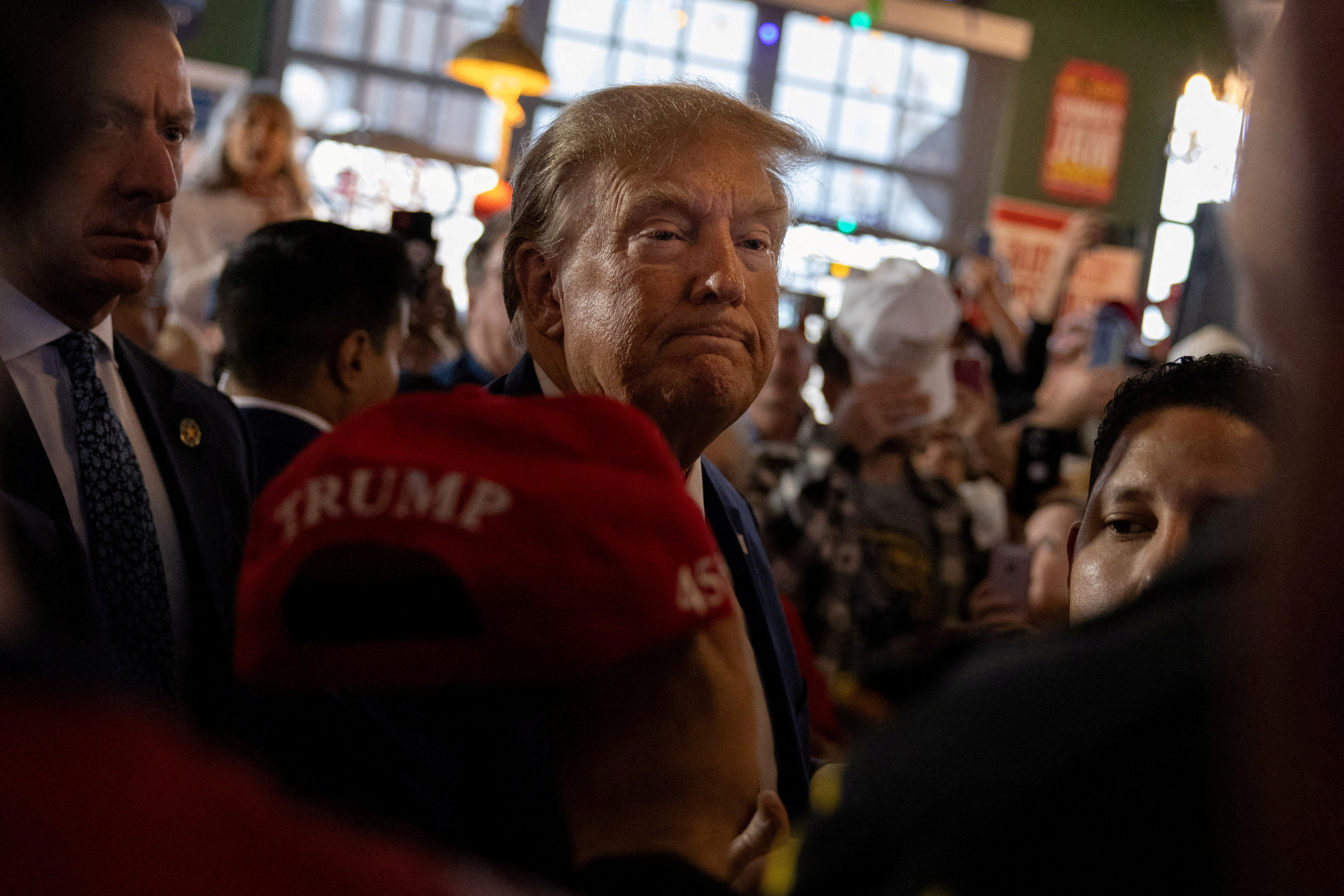 Former U.S. President and Republican presidential candidate Donald Trump attends a commit to caucus event, in Ankeny
