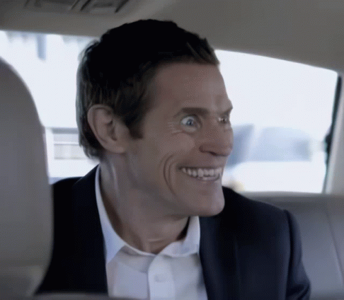 willem-dafoe-the-smile-man.gif
