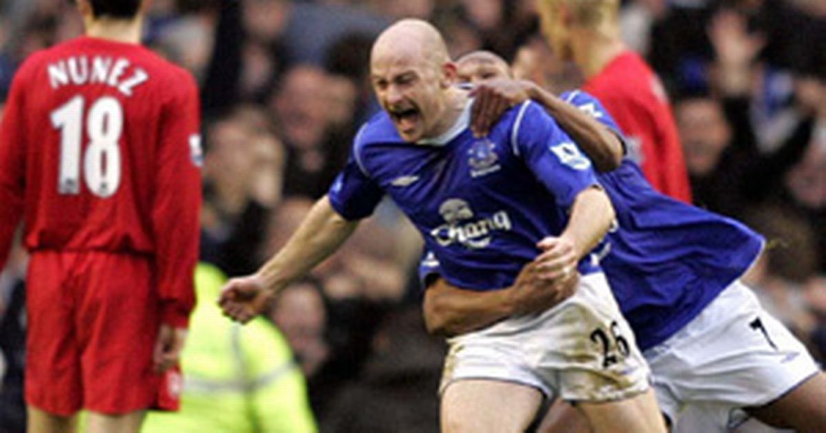 lee-carsley-celebrates-his-goal-against-liverpool-in-2004-300-777771138.jpg