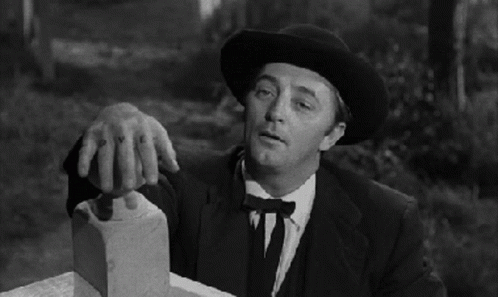 robert-mitchum-night-of-the-hunter.gif