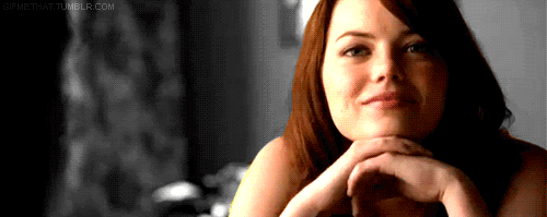Emma-Stone-Chin-on-Hands-Smile.gif