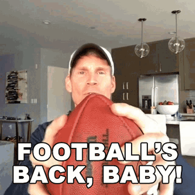 footballs-back-baby-scott-hanson.gif