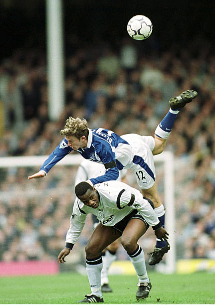 apr-2002-bruno-ngotty-of-bolton-clashes-with-jesper-blomqvist-of-picture-id1117529