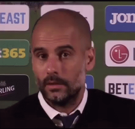 pep-guardiola-wink.gif