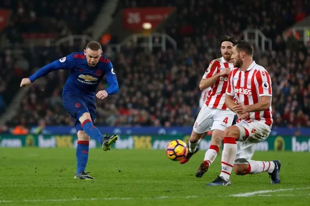 Manchester-Uniteds-Wayne-Rooney-shoots-at-goal.jpg