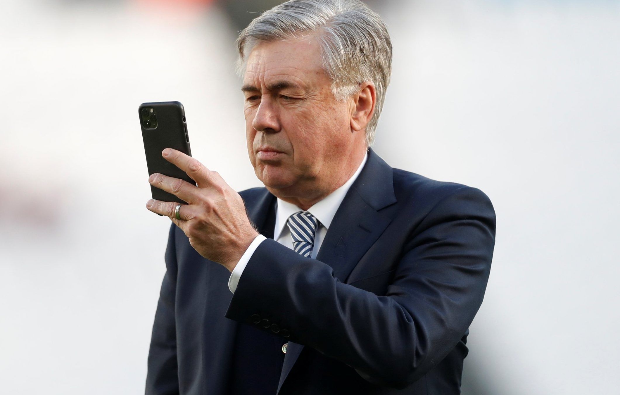Everton-manager-Carlo-Ancelotti-looks-at-phone-before-West-Ham-game-e1579606767988.jpg