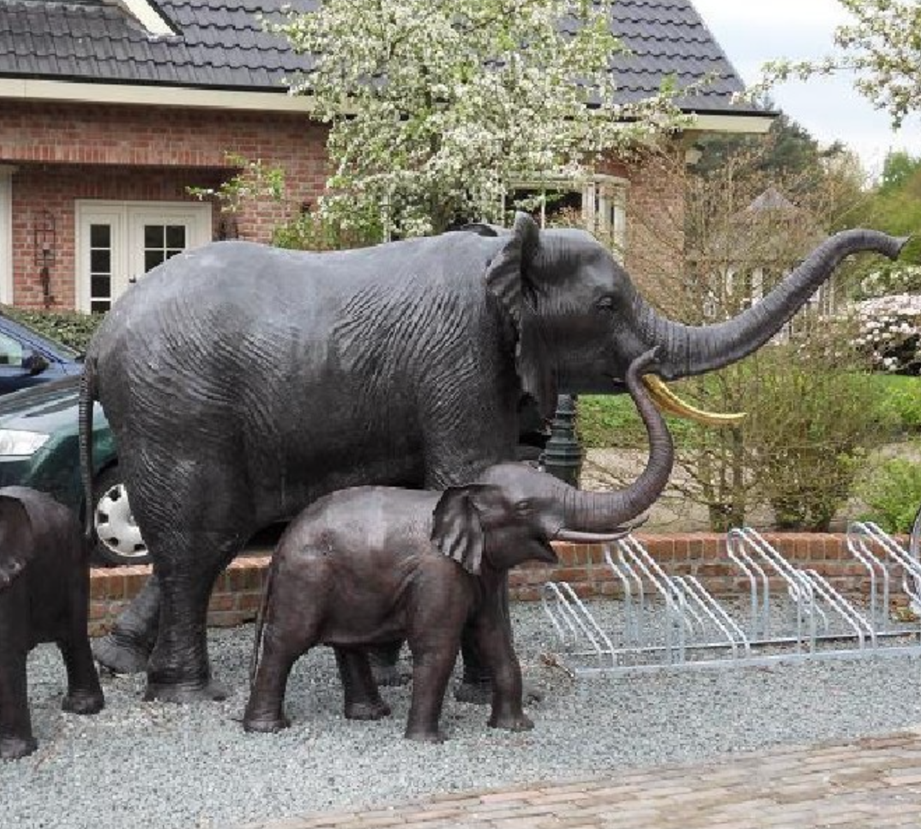 elephant-garden-statue-set-of-3.jpg