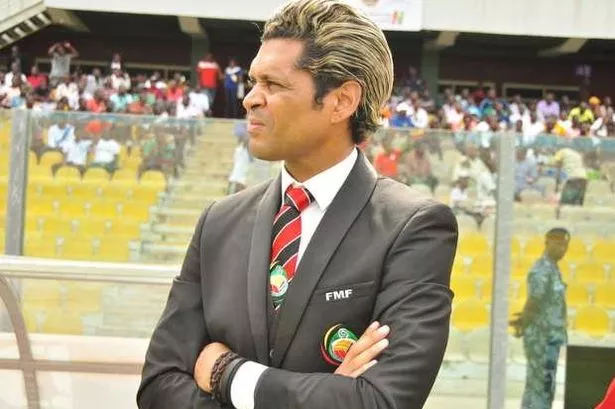 Abel Xavier, manager of Mozambique, but still possessor of an elaborate hairstyle.