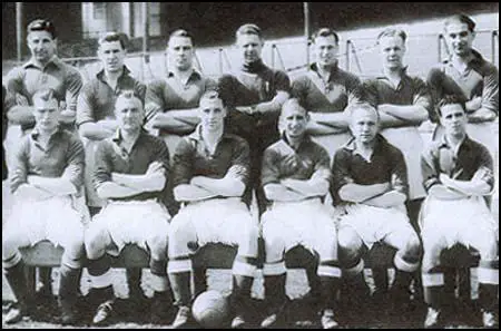 Everton in 1939. Back row, left to right: Jock Thomson, Gordon Watson, Billy Cook,Ted Sager, Joe Mercer, Norman Greenhalgh, John Jones. Front row: Torry Gillick,Stan Bentham, Tommy Lawton, Alex Stevenson, Wally Boyes and Jimmy Caskie.