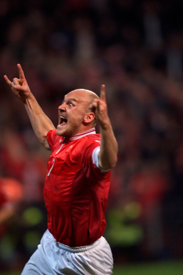 Gravesen celebrates one of his goals against Iceland in a wild fashion