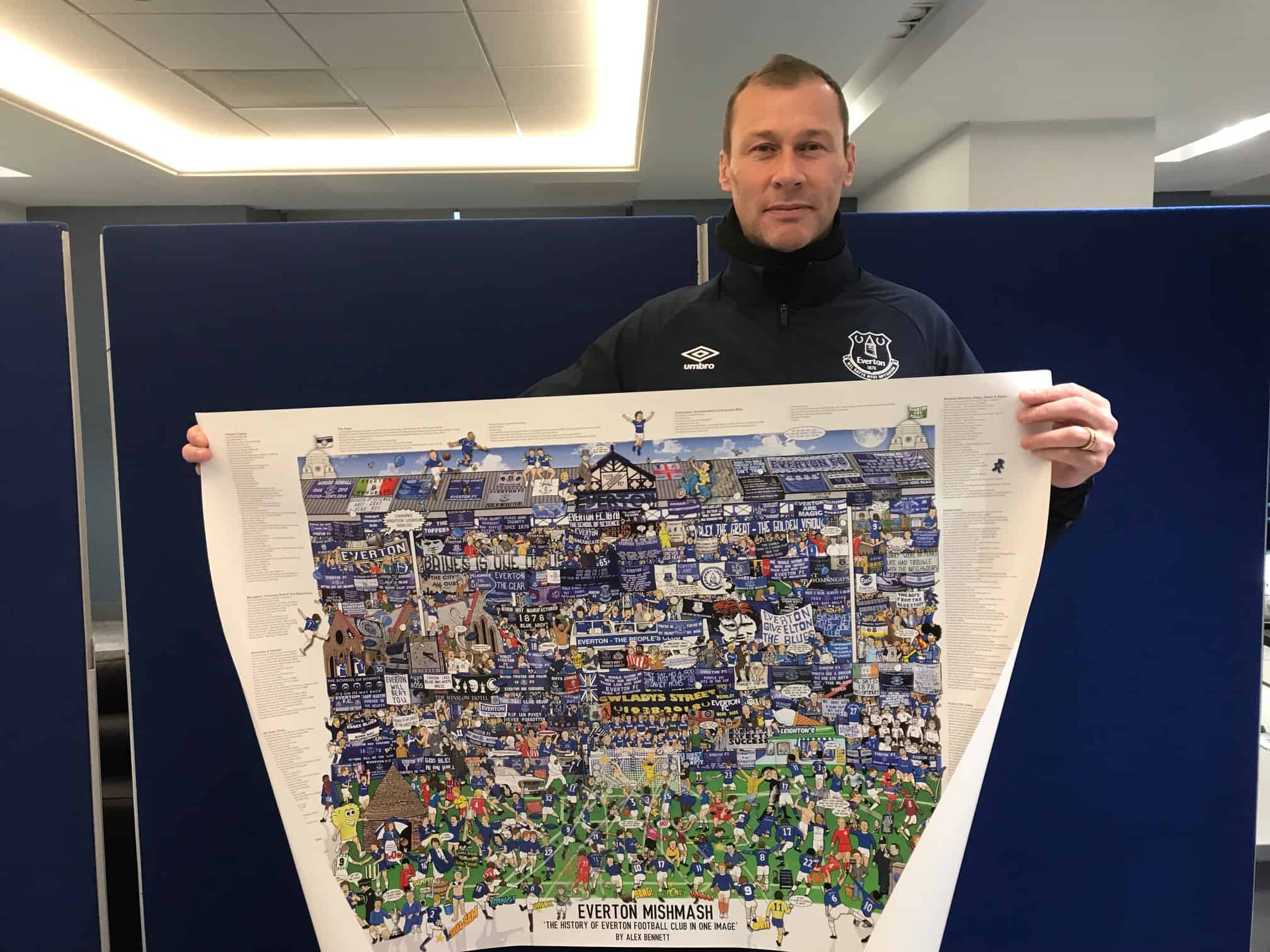 Everton legend Duncan Ferguson holding up the Everton Mishmash history print from Grand Old Team.